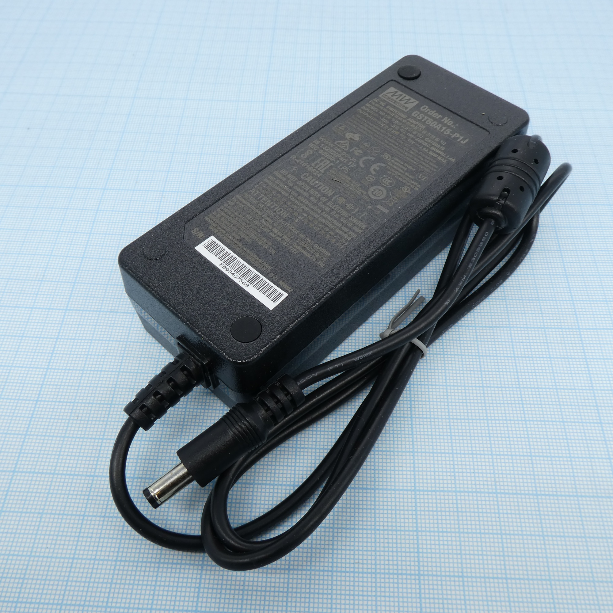 GST60A15-P1J - AC-DC, 60Вт, вход 90...264B AC, 47...63 Гц, 127...370B DC, выход 15B/4A, изоляция 3000В AC, 125x50x31.5мм, -30...+70°С, сетевой разъём IEC320-C14, выходной разъем 11, диам. 5.5х2.1мм