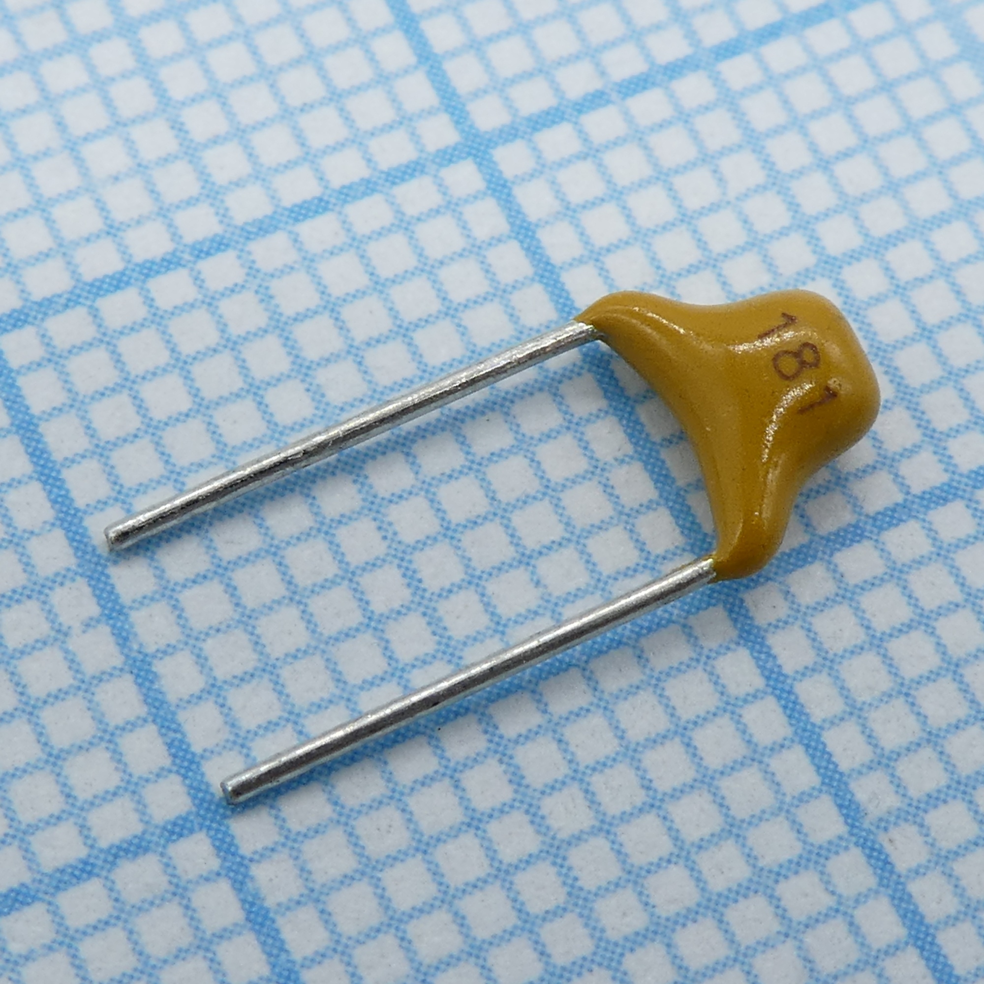 TS170R1H181JSBNB0R - Конденсатор керамический многослойный 180пФ 50В NPO ±5% радиальный 5.08мм 125°C россыпь