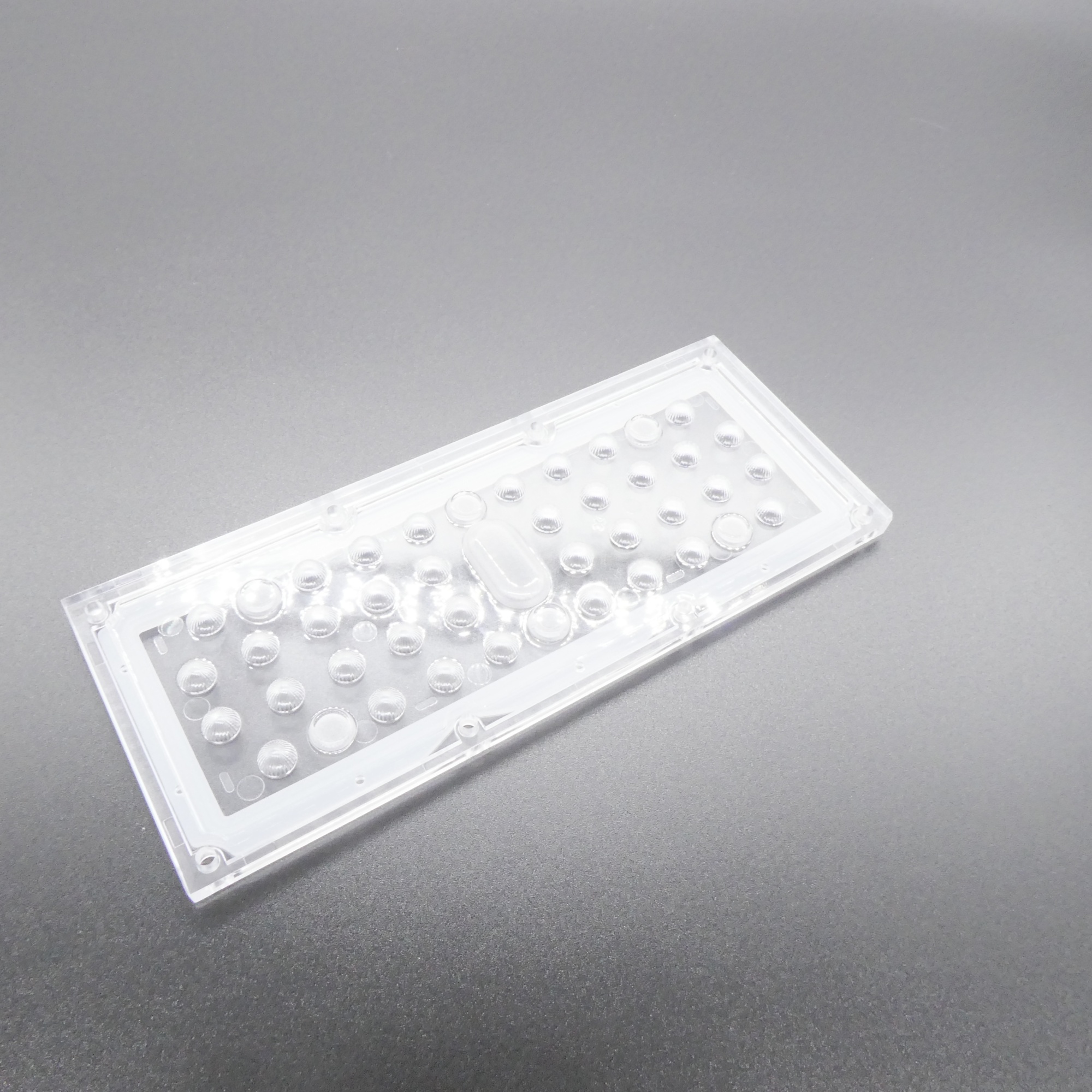 ALHB173D36LED60G - Групповая прямоугольная линза 36 светодиодов 3030/3535,  60°, 173x71.4mm   H:9.3mm, PMMA